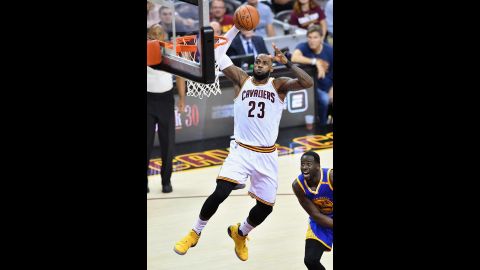 James dunks the ball during Game 4. The Cavaliers scored a Finals-record 86 points in the first half. They also made 24 3-pointers in the game, a Finals record and just one away from the all-time league record.