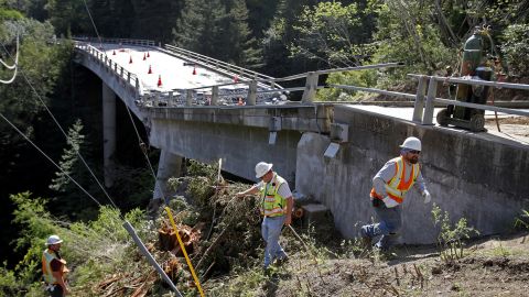 Inspectors check on the demolition of the Pfeiffer Canyon Bridge. It's since been cleared.