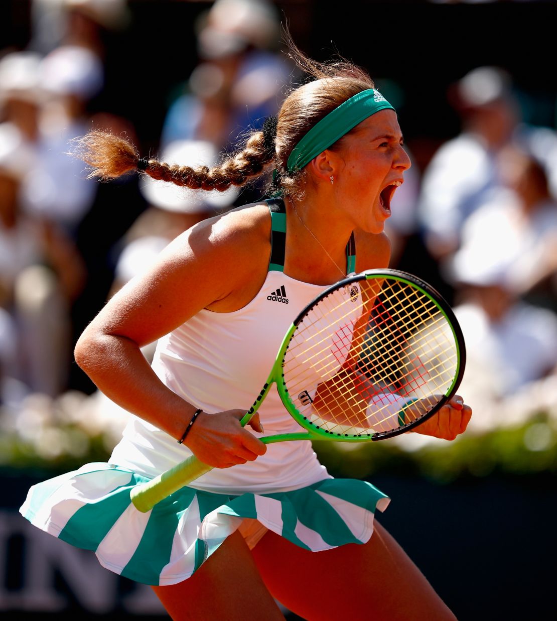 Jelena Ostapenko celebrates during the French Open final against Romania's Simona Halep.