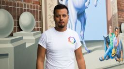 Gabe Martinez with the LGBT Community Center poses for a portrait in front of a new Pulse mural on University of Central Florida's campus of partners Christopher "Drew" Leinonen and Juan Guerrero on Thursday, June 8, 2017 in Orlando, Florida. LGBT Community Center offers free HIV testing and mental health services in Orlando.