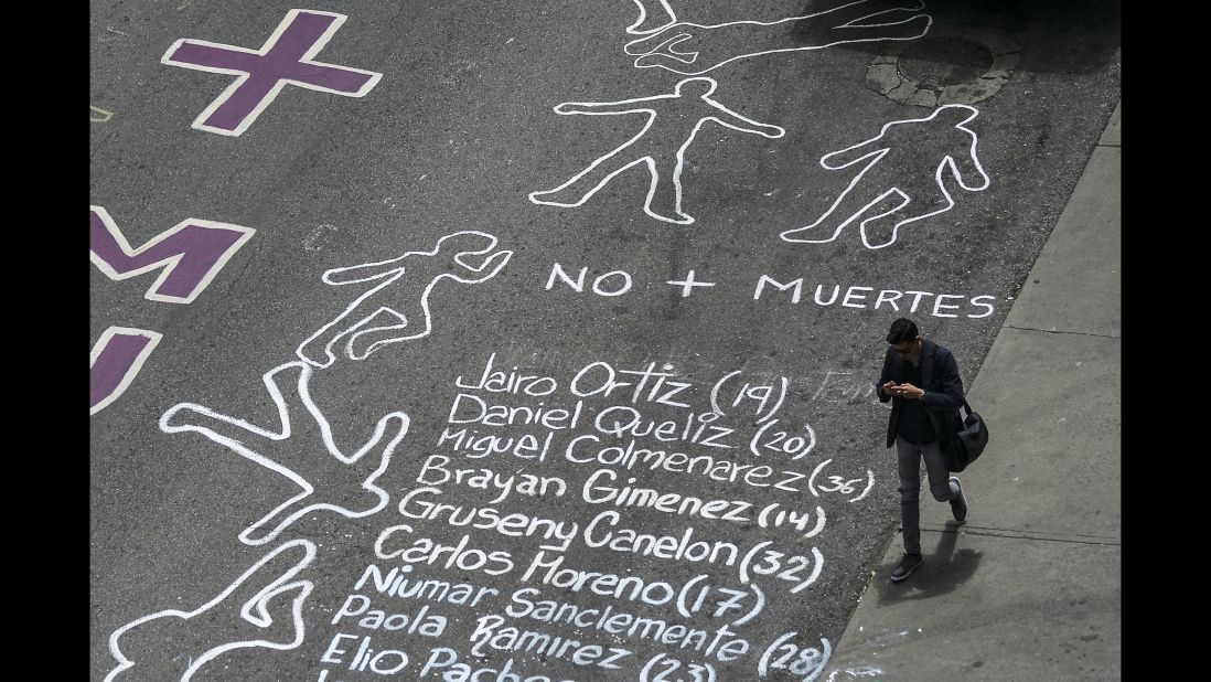 A street in eastern Caracas is painted with the names of people killed during more than two months of protests.