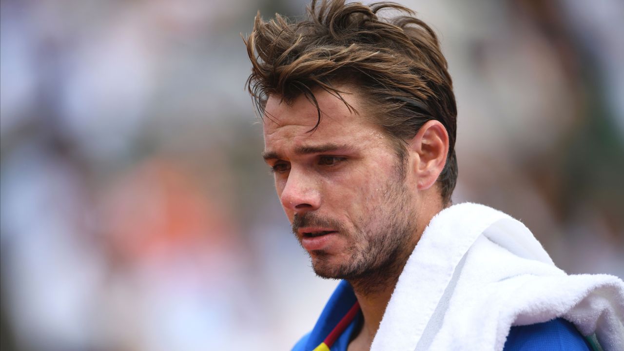 Wawrinka reacts during the men's final against Nadal at the French Open on Sunday.