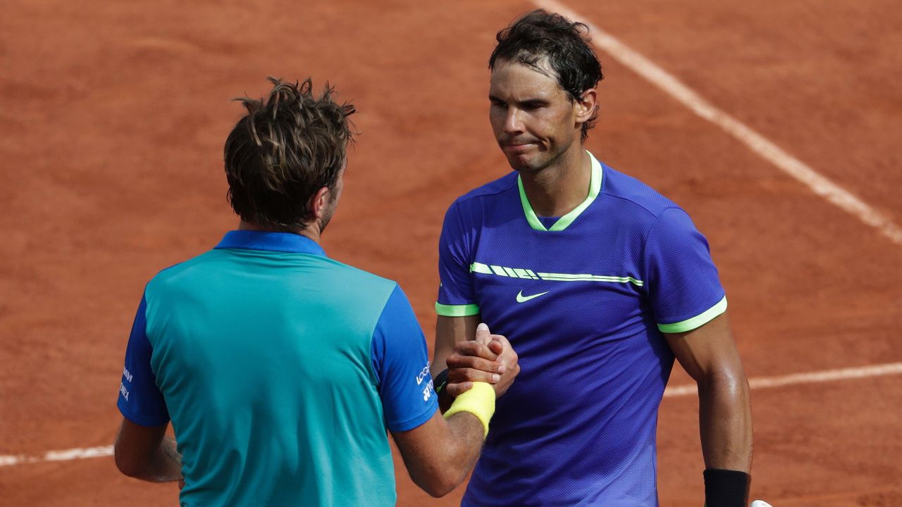 Nadal shakes hands with Wawrinka following their match at Roland Garros.
