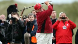 ABERDEEN, SCOTLAND - JULY 10:  Donald Trump opens The Trump International Golf Links Course in Balmedie by hitting the first ball down the first fairway on July 10, 2012 in Balmedie, Scotland. The controversial ?100m course opens to the public on Sunday July 15. Further plans to build hotels and homes on the site have been put on hold until a decision has been made on the building of an offshore windfarm nearby. (Photo by Ian MacNicol/Getty Images)