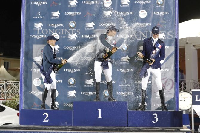 The top three celebrate on the podium, although the result has little bearing on the overall LGCT leaderboard. Delestre and Deusser are 11th and 12th, respectively, while Moya's first ever win puts him in 41st place.