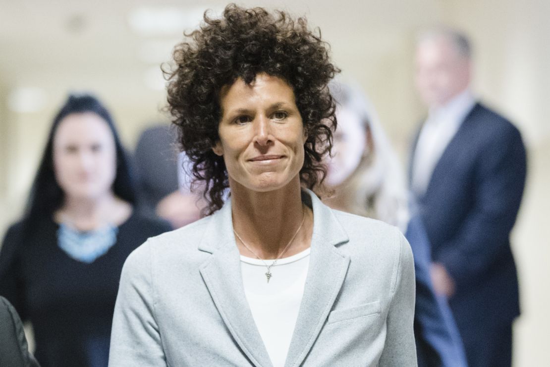 Andrea Constand walks to the courtroom during Bill Cosby's assault trial.