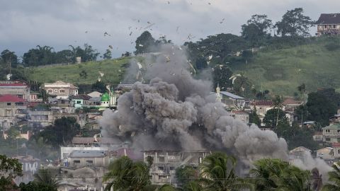 A bomb explodes after being dropped on an Islamist militants' hideout in Marawi, on the southern Philippine island of Mindanao on June 9.