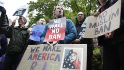 People protest outside as the 9th US Circuit Court of Appeals prepares to hear arguments on US President Donald Trump's revised travel ban in Seattle, Washington on May 15, 2017.  