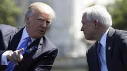 FILE - In this May 15, 2017, file photo, President Donald Trump talks with Attorney General Jeff Sessions,at the 36th Annual National Peace Officers' memorial service on Capitol Hill in Washington.  Sessions did not disclose contacts with foreign dignitaries, including the Russian ambassador, on a security clearance form he filled out as a United States senator last year, the Justice Department acknowledged May 24. The department said Sessions‚Äô staff relied on the guidance of the FBI investigator handling the background check, who advised that meetings with foreign dignitaries ‚Äúconnected with Senate activities‚Äù did not have to be reported on the form. (AP Photo/Evan Vucci, file)