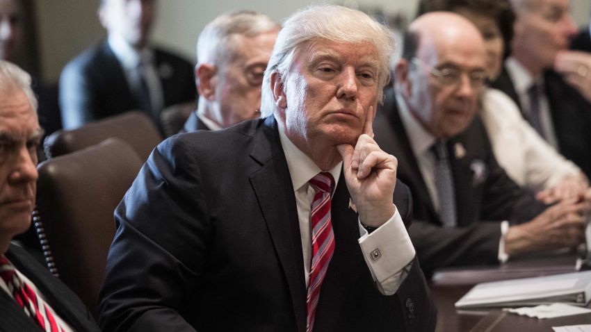 US President Donald Trump listens during a cabinet meeting at the White House in Washington, DC, on June 12, 2017.