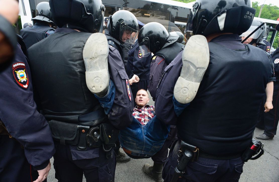 Police arrest a protester in St Petersburg.