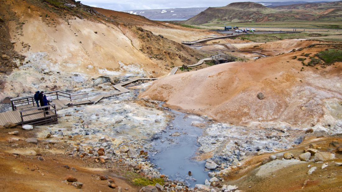 <strong>The Krýsuvík geothermal area</strong> -- This stunning region features gurgling mud pools amid the yellow, red and orange clay-like earth. The dancing steam and hot springs are intertwined with many hiking paths allowing you to feel lost in the moon-like atmosphere. 