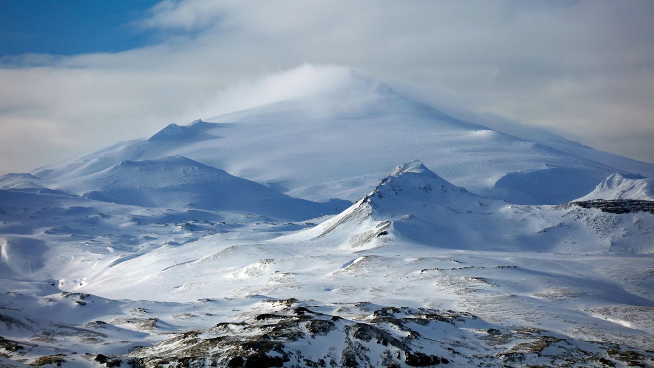 <strong>Snæfellsjökull </strong>-- A huge glacier caps the summit of a volcano on the Snæfellsnes peninsula in the far west of Iceland. The peak soars to 1,446 meters and can be seen across the sea from Reykjavik on a clear day. 