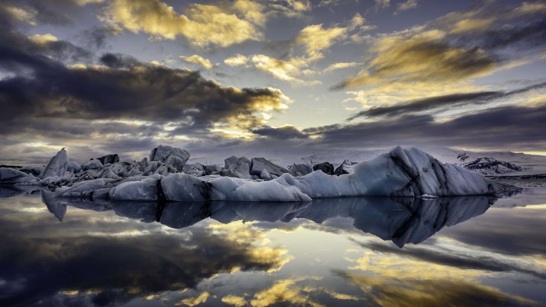 <strong>Jökulsárlón</strong> -- This is a large glacial lake in southeast Iceland at the head of Breiðamerkurjökull glacier. In summer ice blocks carve off the snout and float down to the lake's mouth or wash up on the black sand beaches. <br />