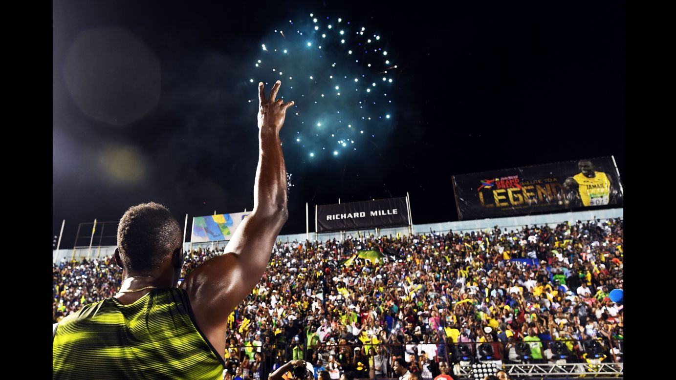 Usain Bolt, the world's fastest man, salutes the crowd Saturday, June 10, after running his final race in his home country of Jamaica. Bolt is retiring in August after the World Championships.