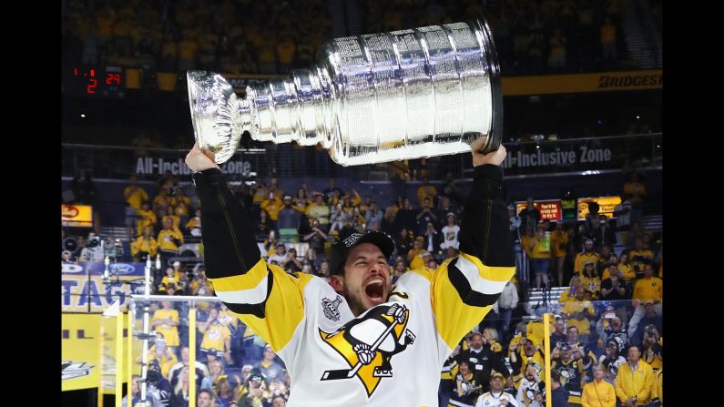 Sidney Crosby lifts the Stanley Cup after the Pittsburgh Penguins defeated Nashville to win their second-straight championship on Sunday, June 11. And like last year, Crosby received the Conn Smythe Trophy, which is awarded to the most valuable player in the postseason.