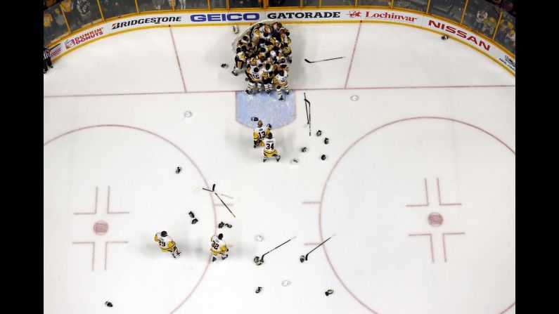 The Pittsburgh Penguins celebrate together after winning the Stanley Cup on Sunday, June 11. It is the fifth Cup in franchise history.