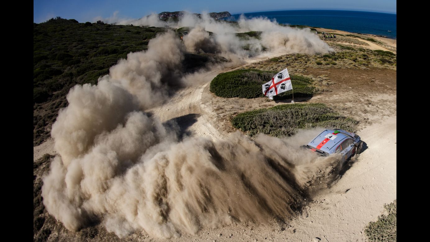 Hayden Paddon's car kicks up dust during the World Rally race in Alghero, Italy, on Saturday, June 10.