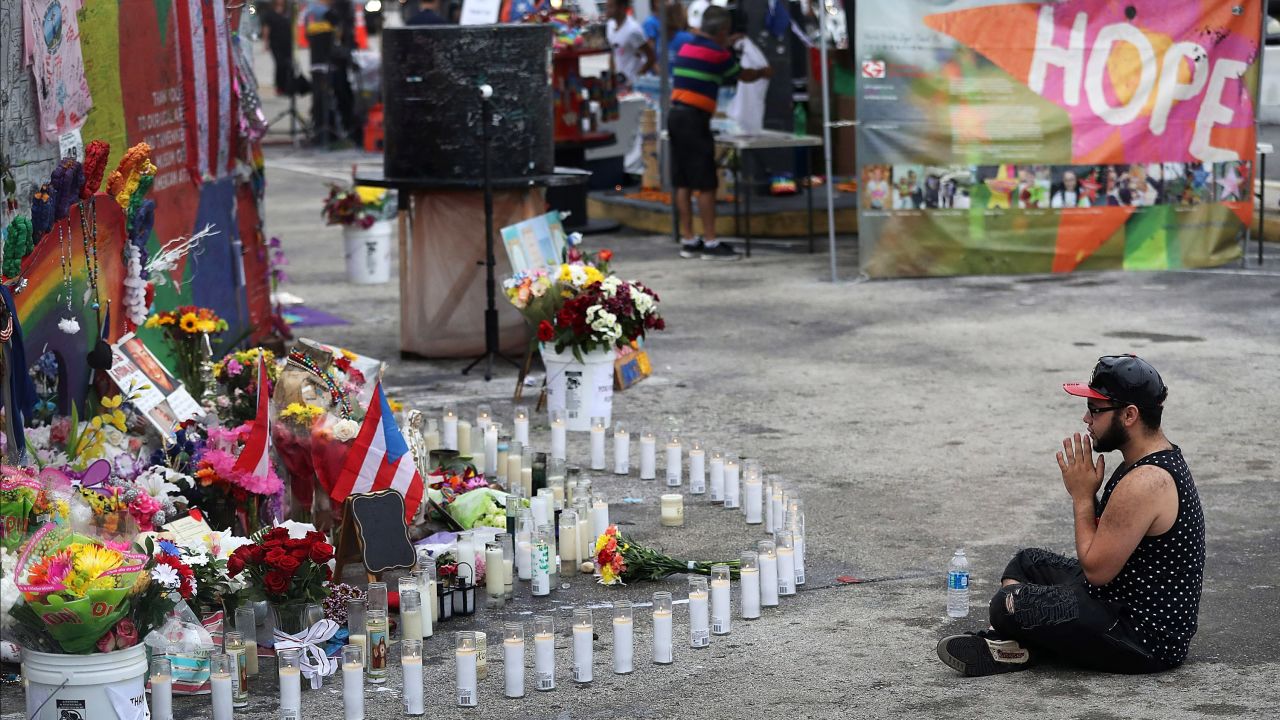 Jose Ramirez, a survivor of the shooting, visits the memorial site on June 12.