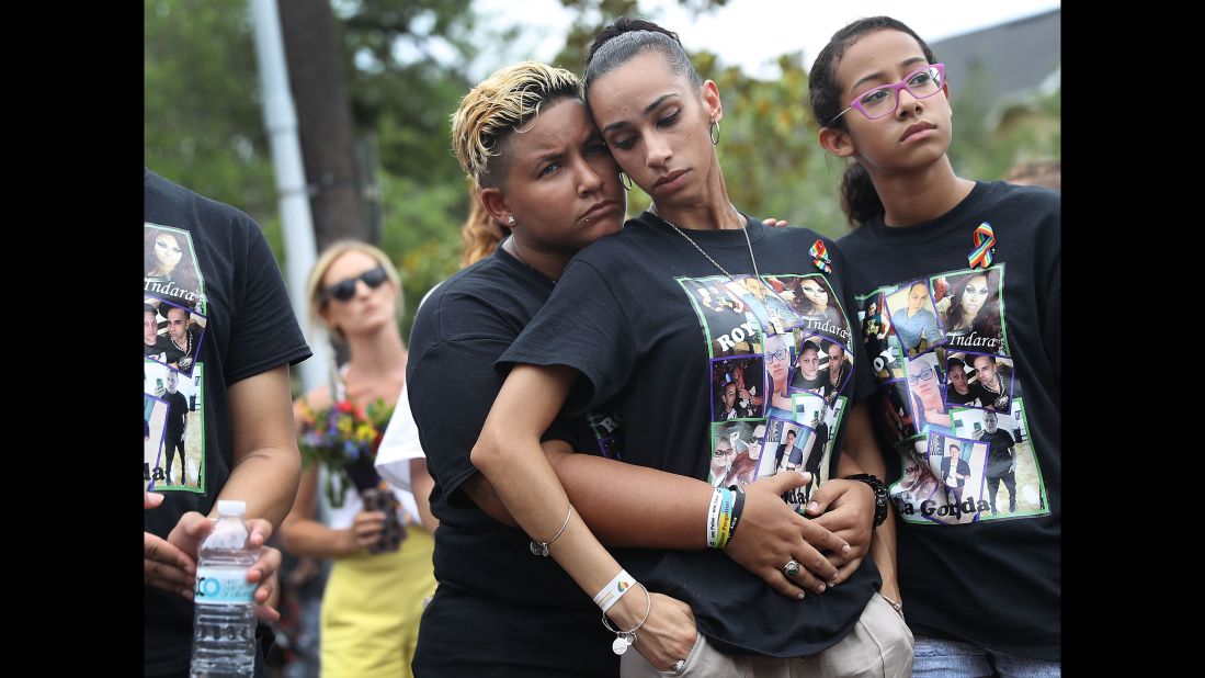 Angel Ayala, left, and Carla Montanez mourn the loss of their best friend.