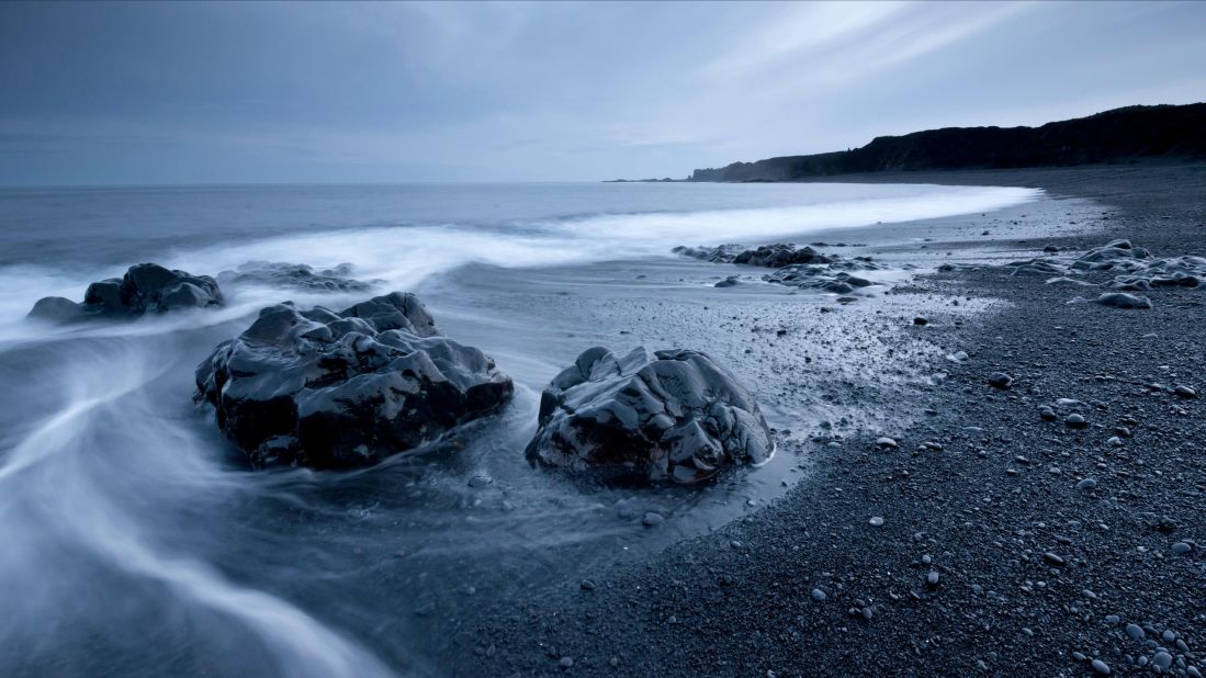 <strong>Djúpalónssandur </strong>-- This beach at the foot of Snæfellsjökull is covered by small black pebbles that were smoothed and shaped by the force of the tides and whipping of the wind. Visitors love to wander among the frozen lava landscapes and curious rock formations. 