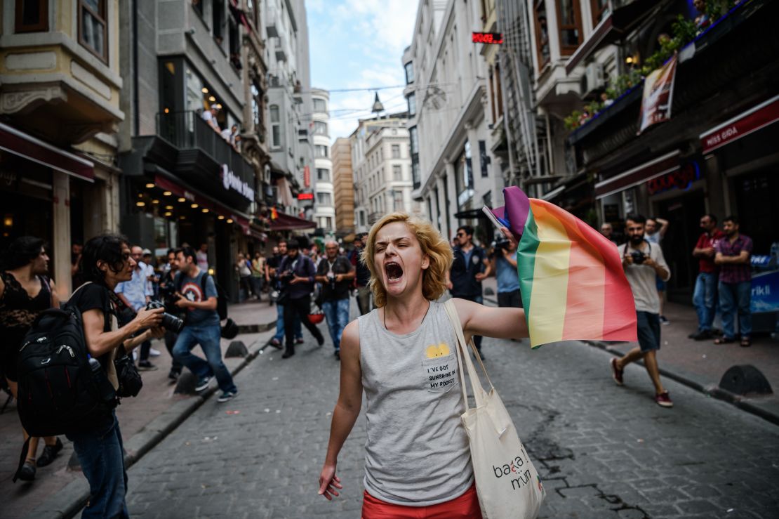 A protester waves a rainbow flag during a rally staged by the LGBT community in Istanbul in 2016.