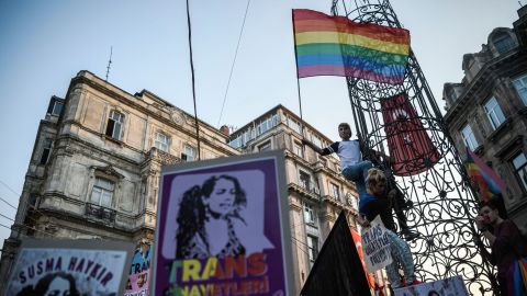 A protester waves a rainbow flag during a demonstration in August 2016 over the murder of transgender activist Hande Kader in Istanbul. 