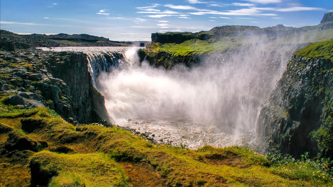 <strong>Dettifoss</strong> -- The water comes from the nearby Vatnajökull glacier and has a greyish color because of the sediment-rich glacial run-off.