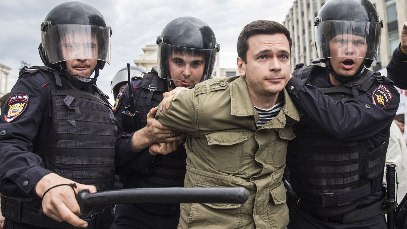 Police detain Russian opposition activist Ilya Yashin in Moscow.