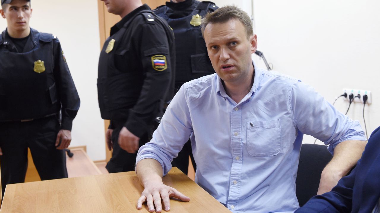 Russian opposition leader Alexei Navalny speaks after a hearing in a court in Moscow, late on June 12, 2017. A Russian court sentenced Kremlin critic Alexei Navalny to 30 days behind bars.