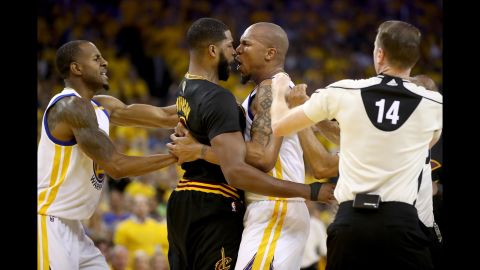 Cleveland's Tristan Thompson goes face to face with Golden State's David West during a first-half scrum in Game 5. Both players received technical fouls.