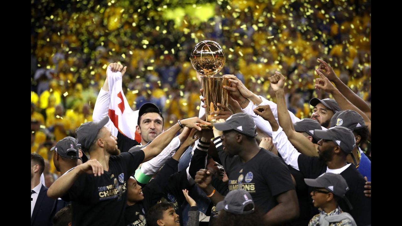 The Golden State Warriors celebrate after defeating Cleveland to win the 2017 NBA Finals.