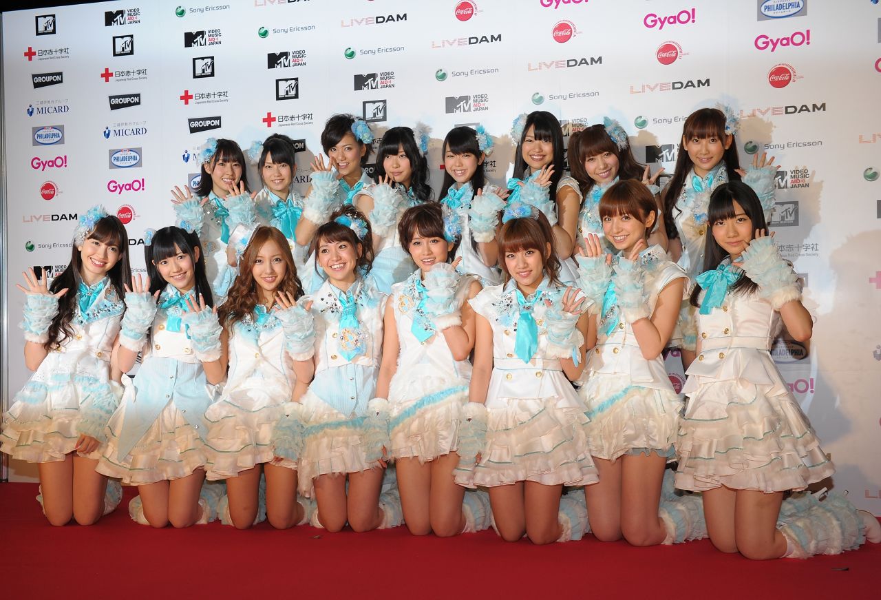 AKB48 poses for photographs on the red carpet during the MTV Video Music Aid Japan at Makuhari Messe on June 25, 2011 in Chiba, Japan.