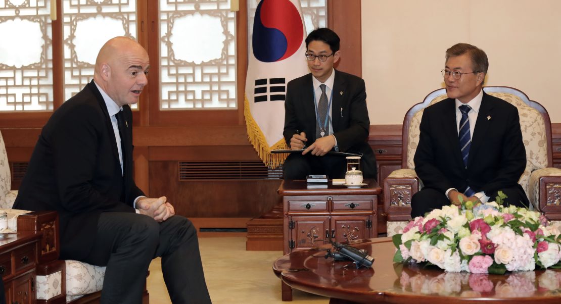 South Korean President Moon Jae-in, right, talks with FIFA President Gianni Infantino at the presidential Blue House in Seoul, South Korea.