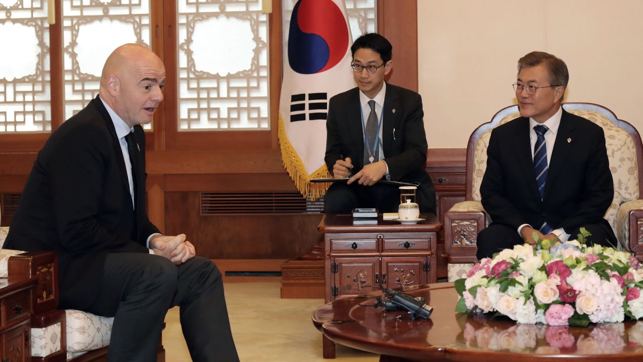 South Korean President Moon Jae-in, right, talks with FIFA President Gianni Infantino at the presidential Blue House in Seoul, South Korea.
