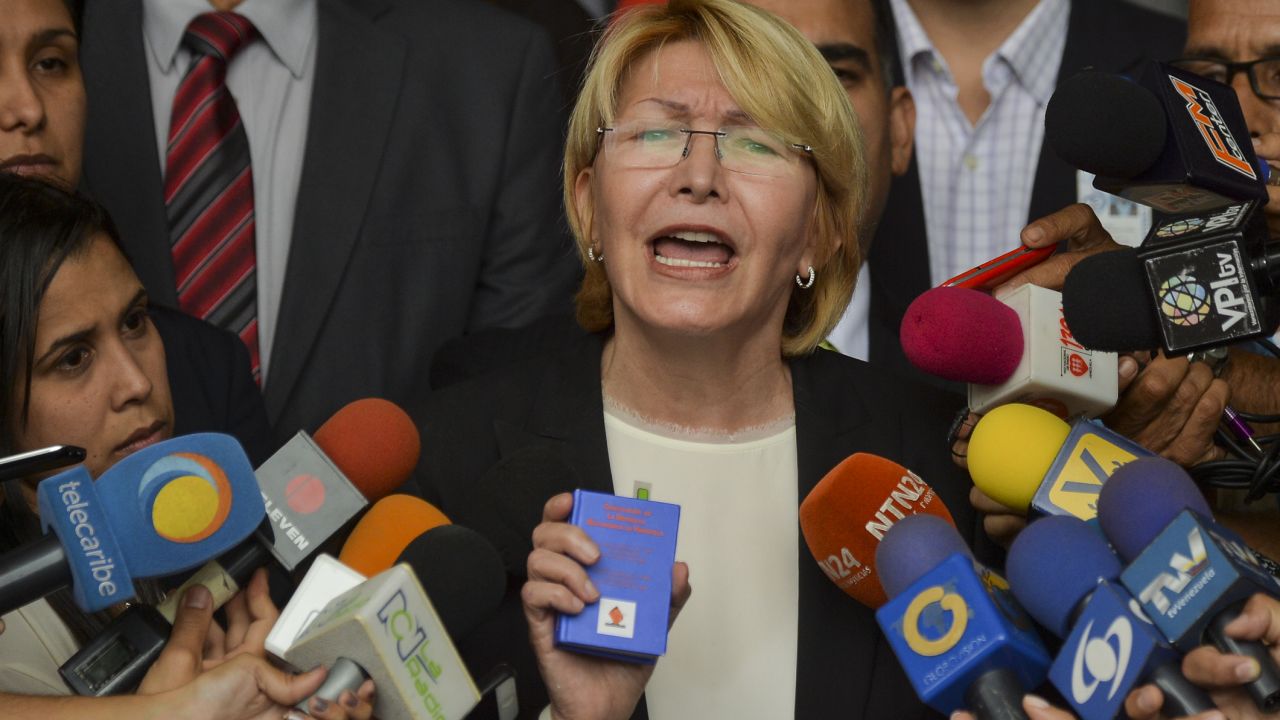 Venezuela's Attorney General Luisa Ortega Diaz speaks to the media during a press conference, outside the Supreme Court of Justice building in Caracas on June 8, 2017.
Ortega Diaz started a nullity appeal against Venezuelan President Nicolas Maduro's referendum on contested constitutional reforms. / AFP PHOTO / LUIS ROBAYO        (Photo credit should read LUIS ROBAYO/AFP/Getty Images)