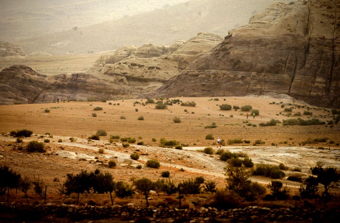 Runners tackle the inhospitable landscapes of the Petra Desert marathon
