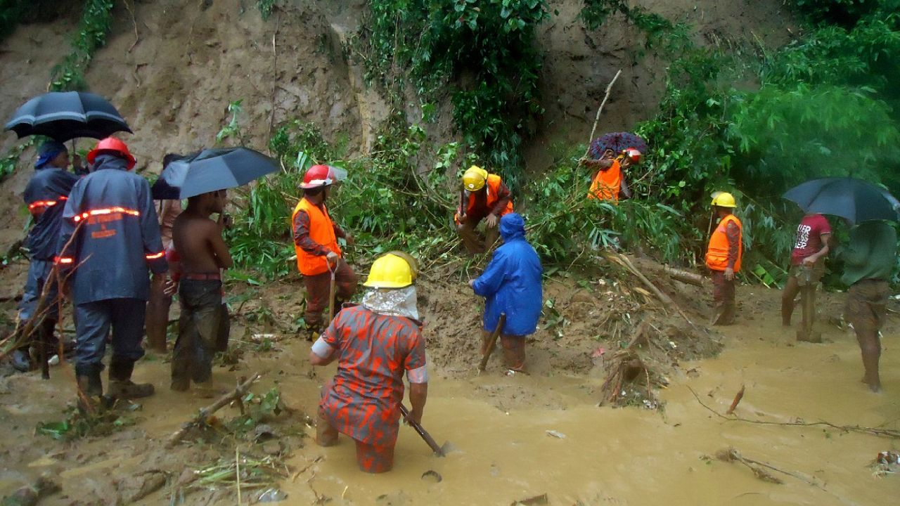 Firefighters search for bodies in Bandarban. Authorities fear the death toll will rise. 