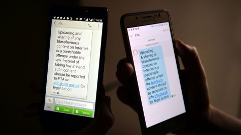 Pakistani cellphone users reads a text message circulated by the Pakistan Telecommunication Authority on May 10.