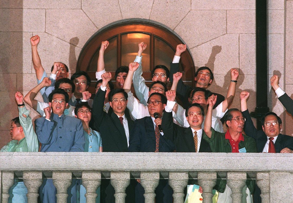 Directly elected lawmakers addressed a crowd from a balcony of the city's parliament on July 1, 1997. The flames of democracy, they promised, would never be "snuffed out."