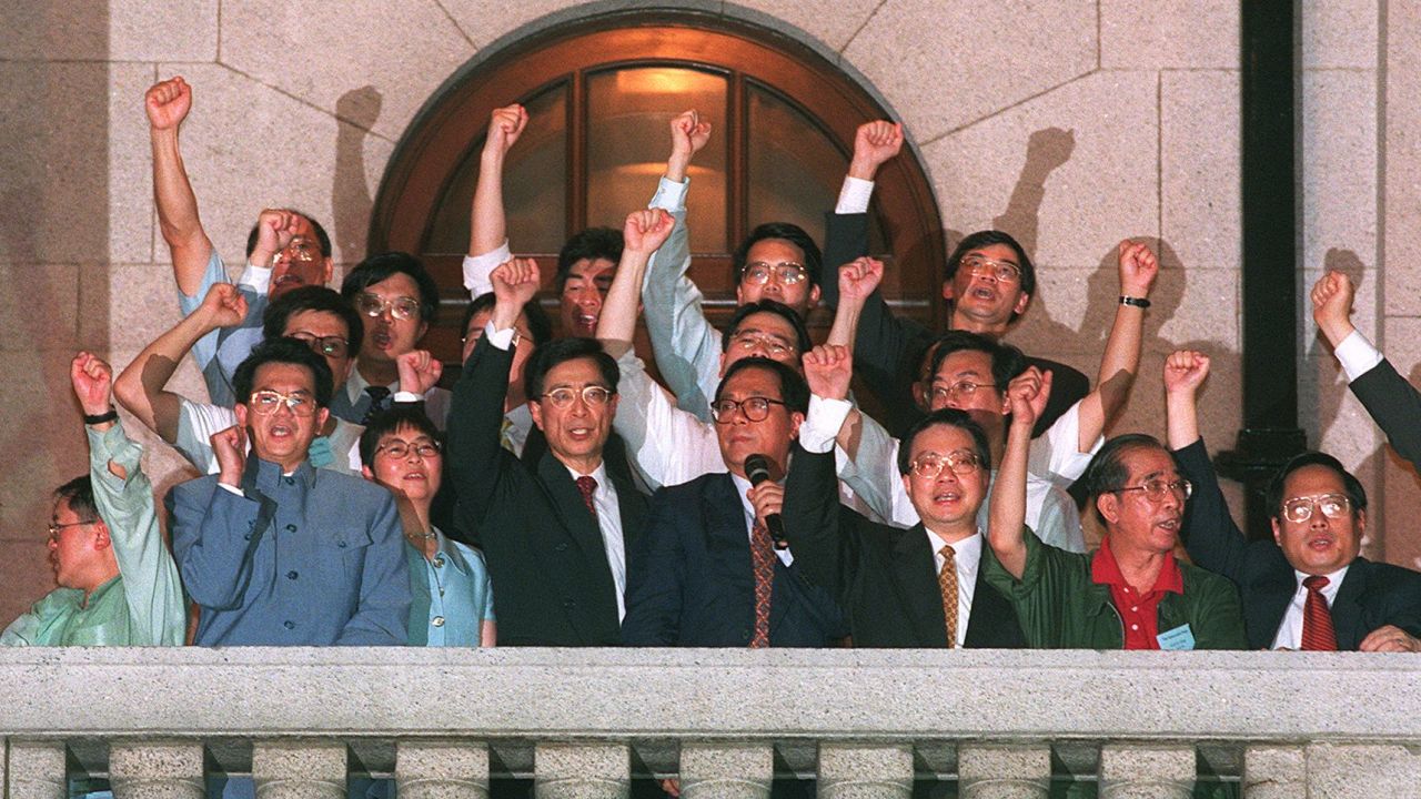 Directly elected lawmakers addressed a crowd from a balcony of the city's parliament on July 1, 1997. The flames of democracy, they promised, would never be "snuffed out."