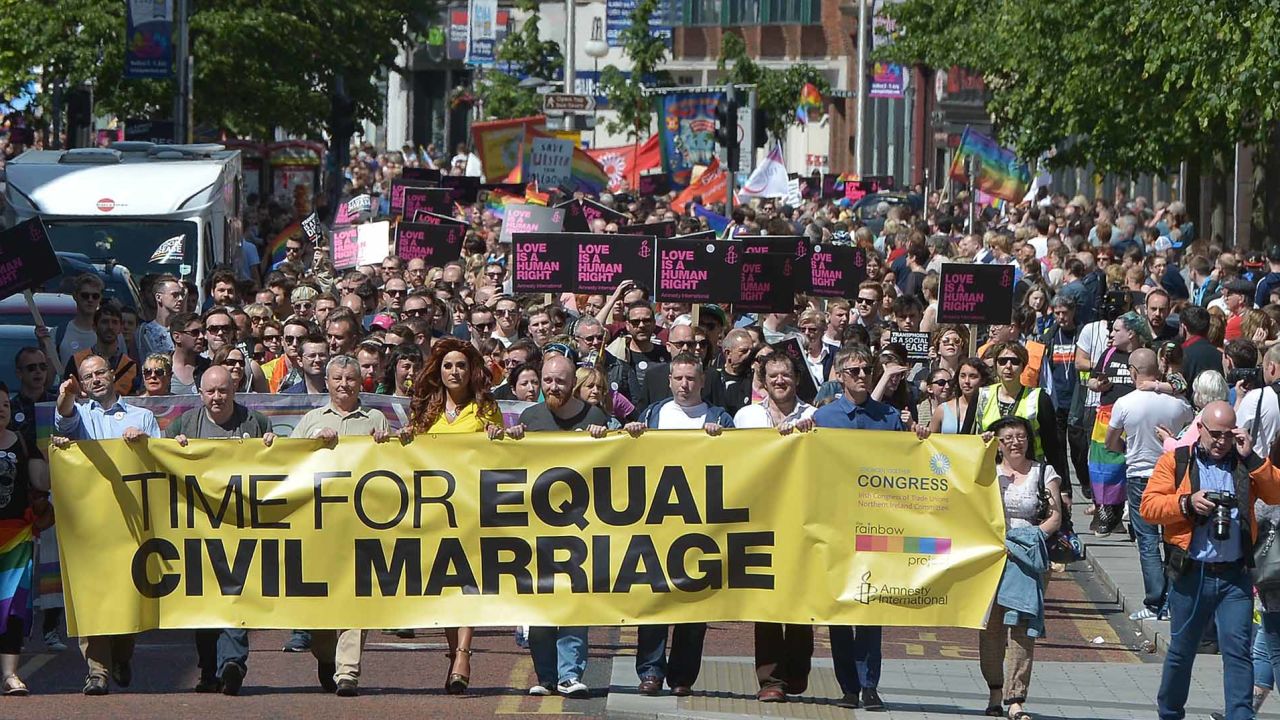 Thousands of people take part in a march through Belfast calling for same-sex marriage to be legalized in June 2015.