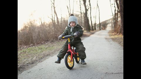 <strong>Sweden:</strong> A child learns to ride a bike in Sweden, where nobody is forcibly displaced by conflict.