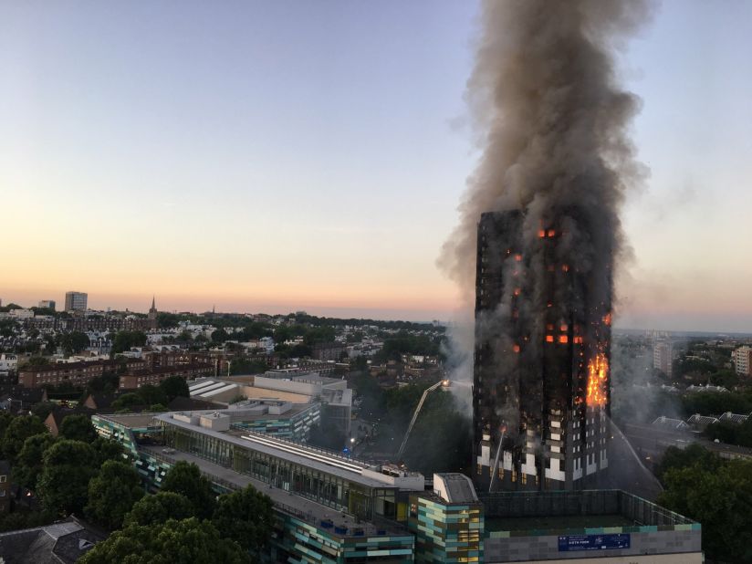 Firefighters battle the massive blaze.