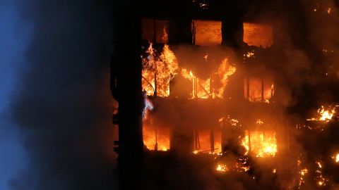 Flames and smoke engulfed Grenfell Tower on June 14.