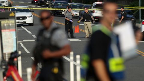 ALEXANDRIA, VA - JUNE 14: Investigators gather near the scene of an opened fire June 14, 2017 in Alexandria, Virginia. Multiple injuries were reported from the instance. (Photo by Alex Wong/Getty Images)