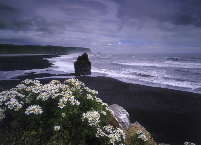 <strong>Reynisdrangar --</strong> The nearby village of Vik sits on a flat coastal plain and is the southernmost settlement in Iceland.