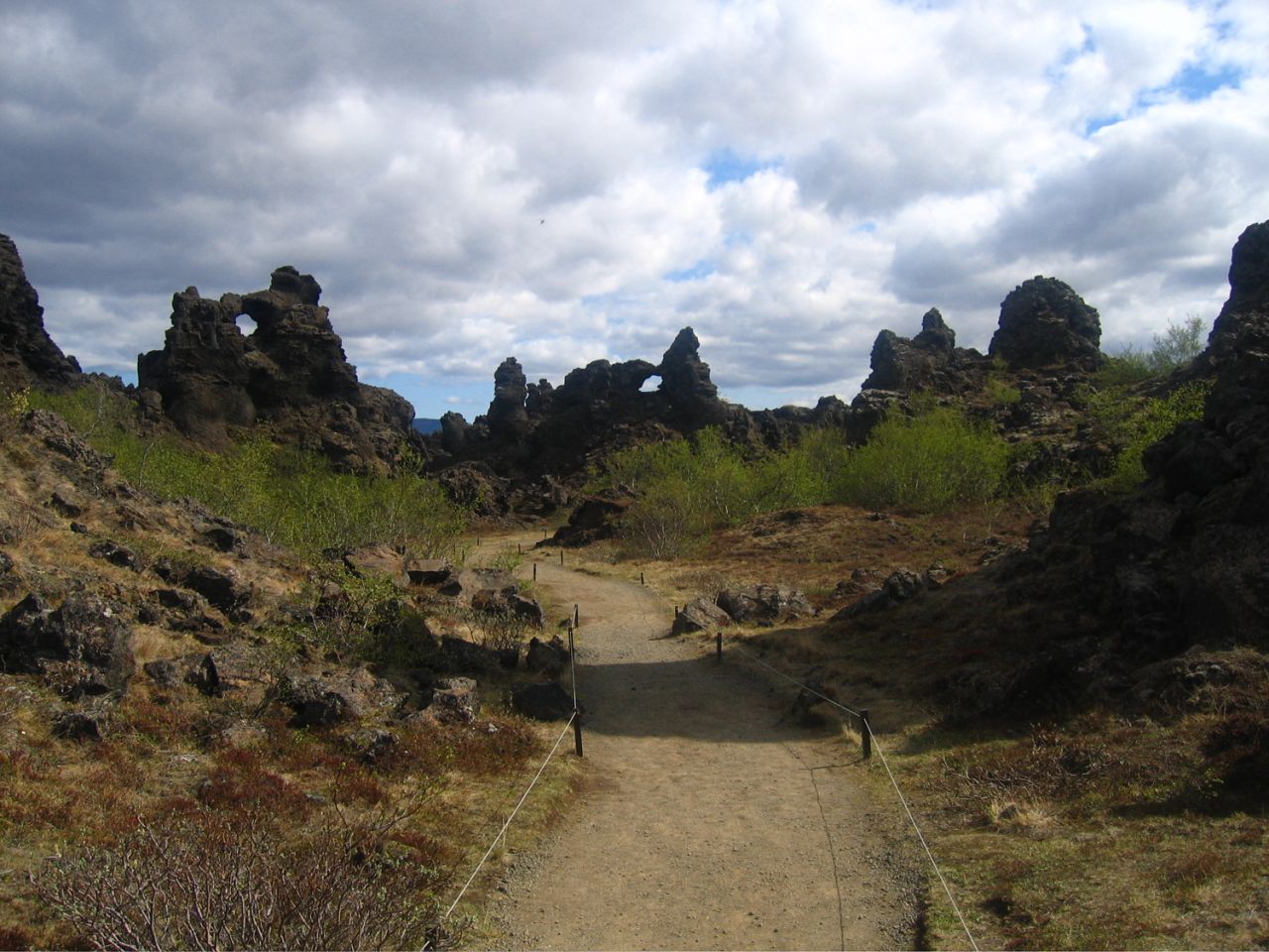 <strong>Dimmuborgir</strong> -- The black lava pillars were born from a collapsed lava tube from a large volcanic eruption more than 2,000 years ago.