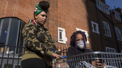 Aisha Hailstones and her daughter Santana brought supplies to the local community center.
