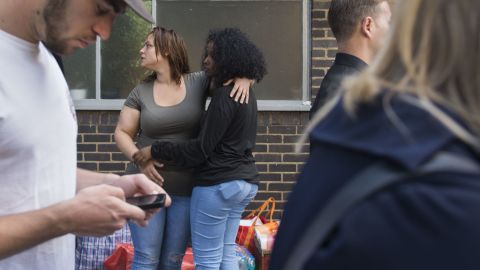 Friends and neighbors consoled one another throughout the day.
